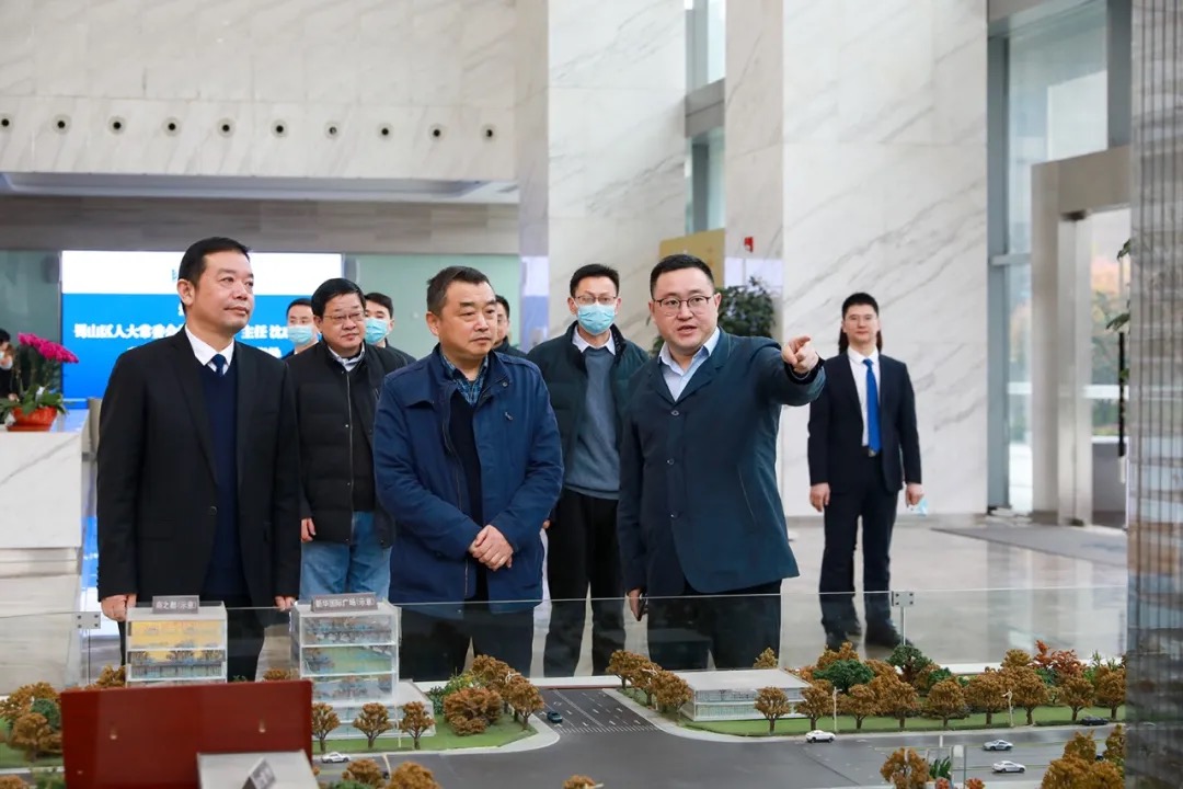 合肥市蜀山區人大常委會主任沈成富一行深入新華控股集團和華地集團調研指導！